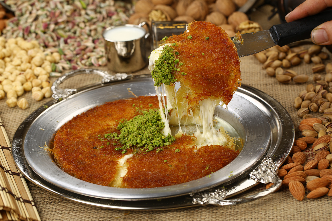 Turkish dessert kunefe with pistachio powder - Kanafeh , kunefe , kunafa , kadayif ,kataifi