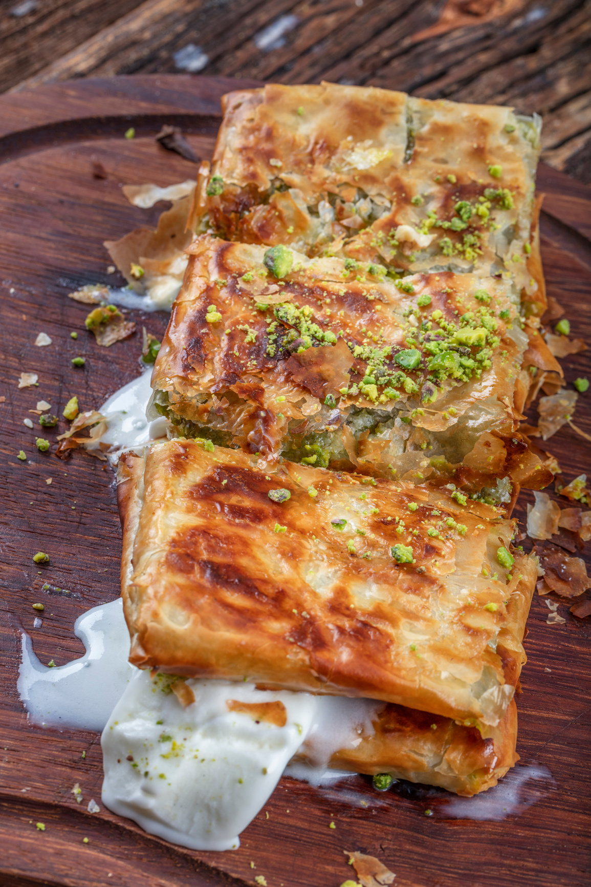 Turkish Dessert Katmer with Pistachio Powder served with ice cream.